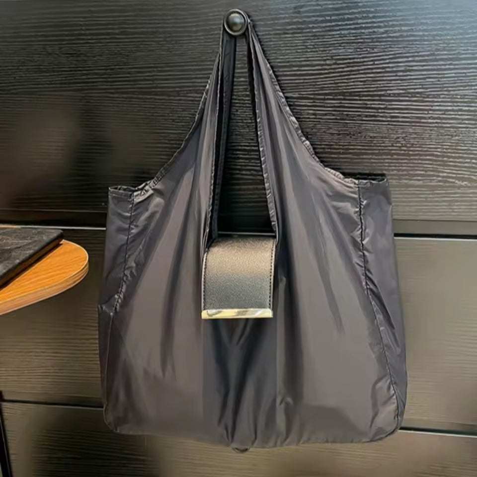 Customer carrying tote at market